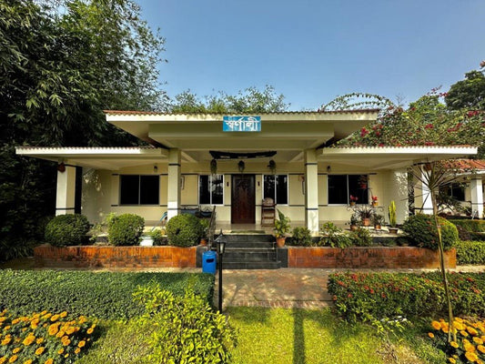 A charming private cottage in Dhaka hotel, resort, Savar, Barnochata, featuring a sign on the front